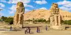 Admire the colossal statues of the Colossi of Memnon on your unforgettable Egypt and Jordan travel packages.